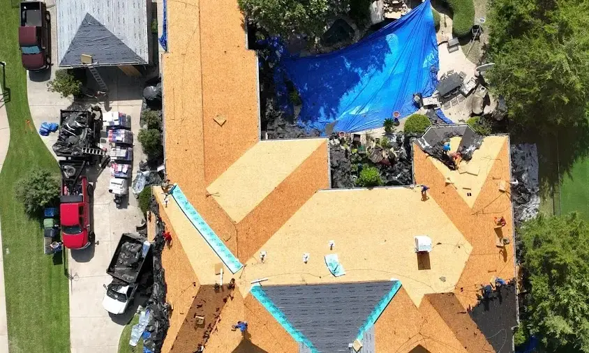 Professional Storm Damage Roof Repair being performed in North Oaks